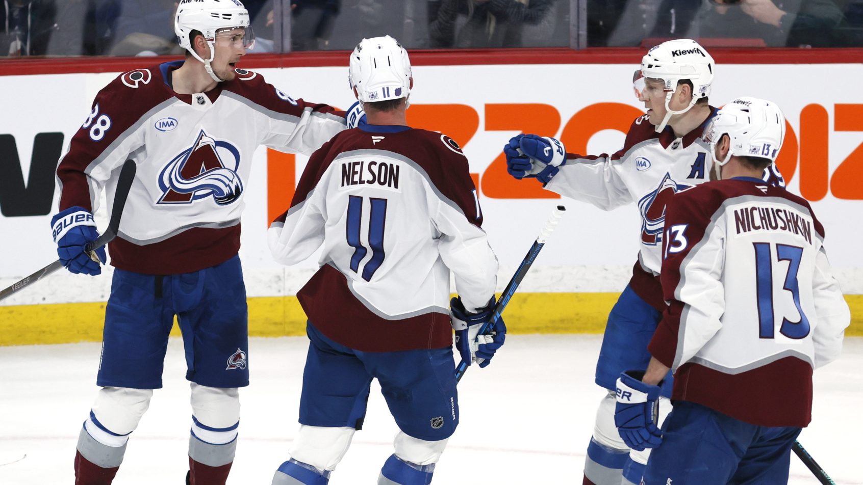 The Avalanche celebrate a goal versus the Jets.