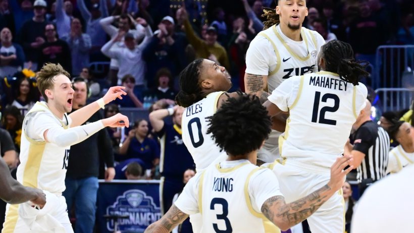 Akron Zips players celebrate a buzzer-beater