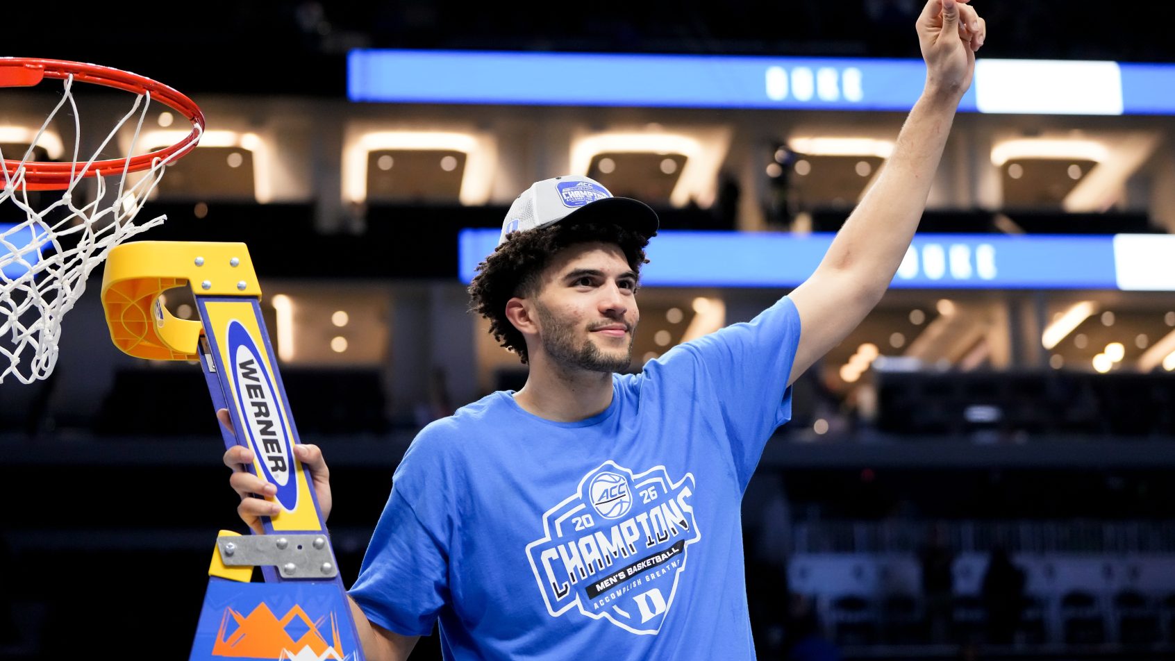 Cameron Boozer cutting down the nets after the 2026 ACC Tournament