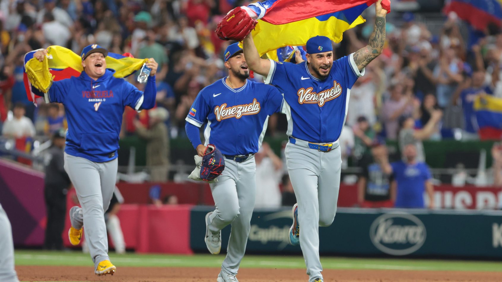 Venezuela celebrates their WBC semifinal win over Italy.