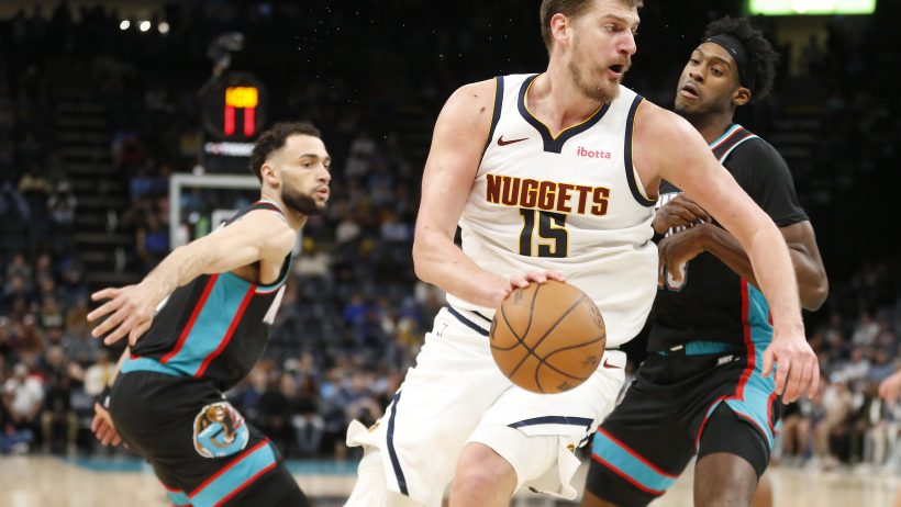 Denver Nuggets center Nikola Jokic spins to the basket