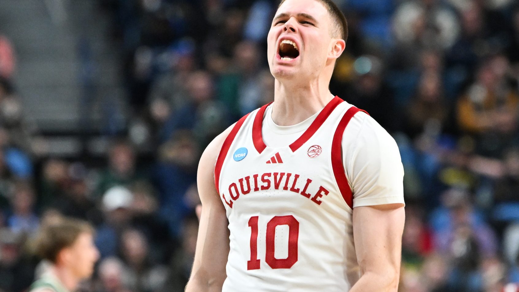 Isaac McKneely celebrates a bucket versus South Florida in the 1st Round of the NCAA Tournament.