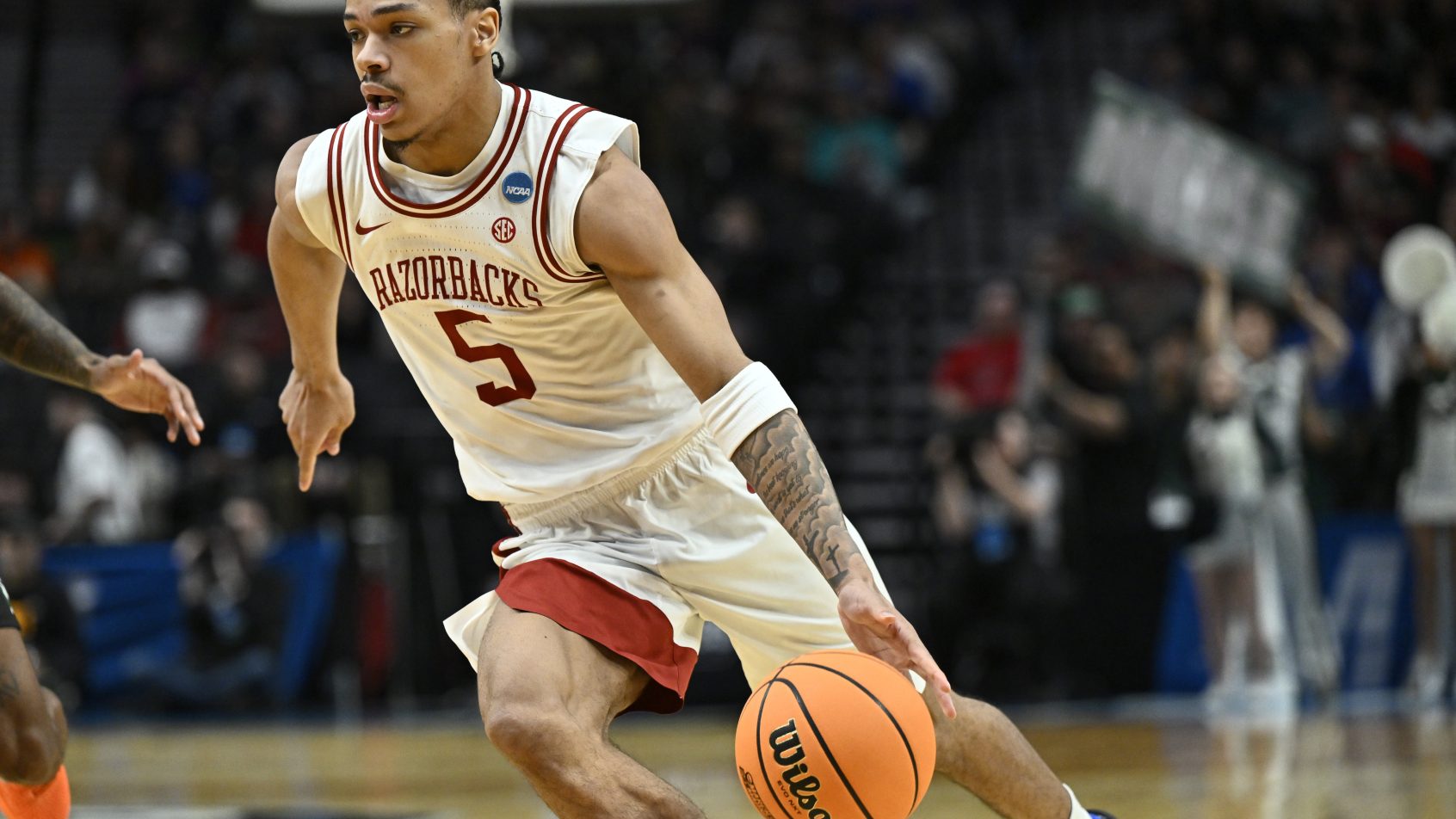 Darius Acuff Jr dribbling