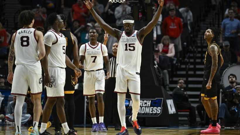 Graham Ike arms up celebrating