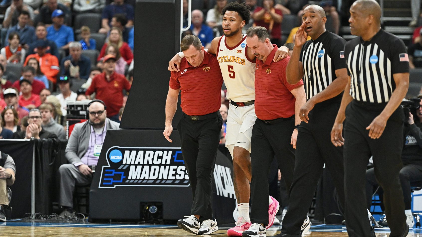 Iowa State Cyclones forward Joshua Jefferson getting helped off the floor