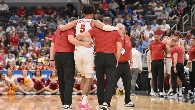 Iowa State Cyclones forward Joshua Jefferson gets helped off the court