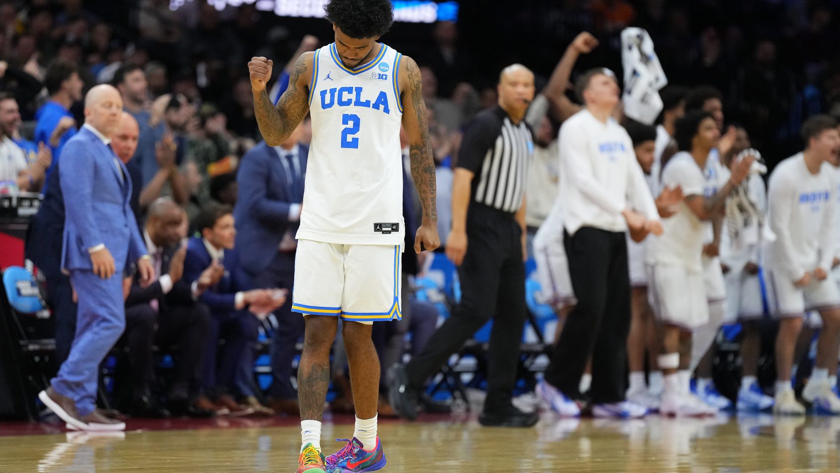 UCLA Bruins guard Donovan Dent fist pumps
