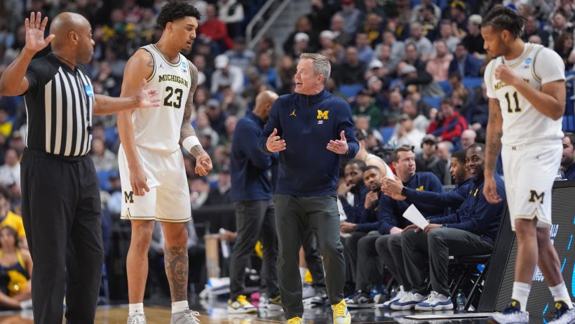 Dusty May talks to his Michigan team