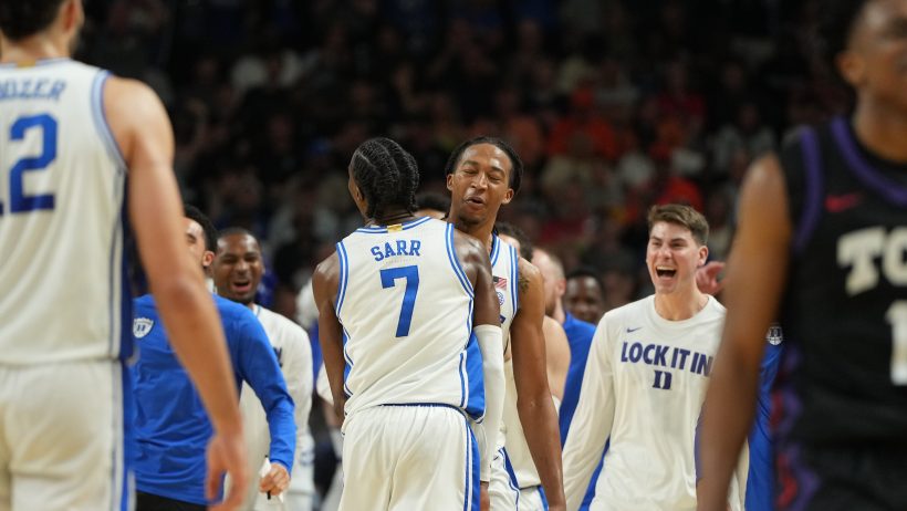 Duke basketball celebrating with each other