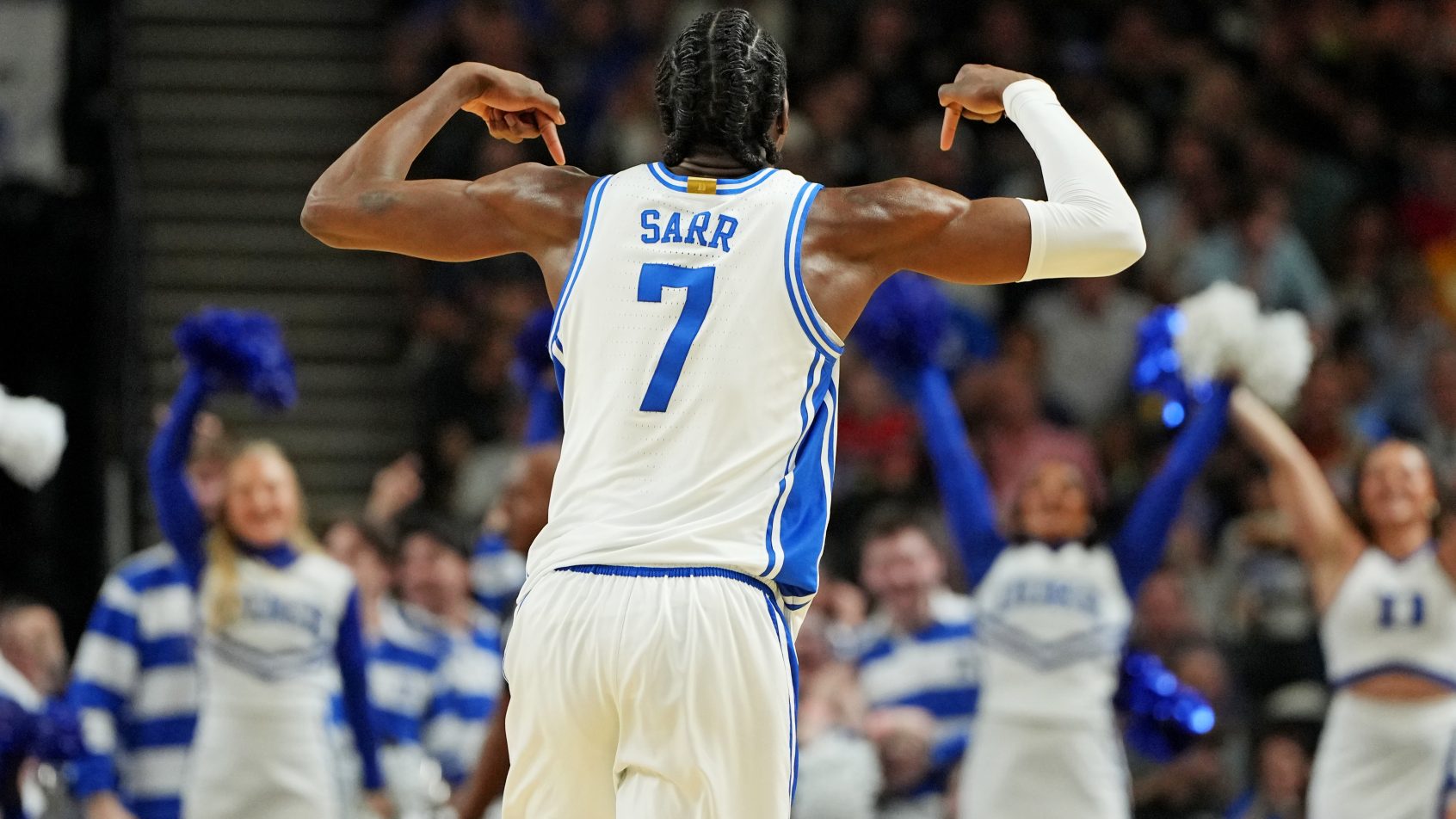 Duke Blue Devils guard Dame Sarr flexing