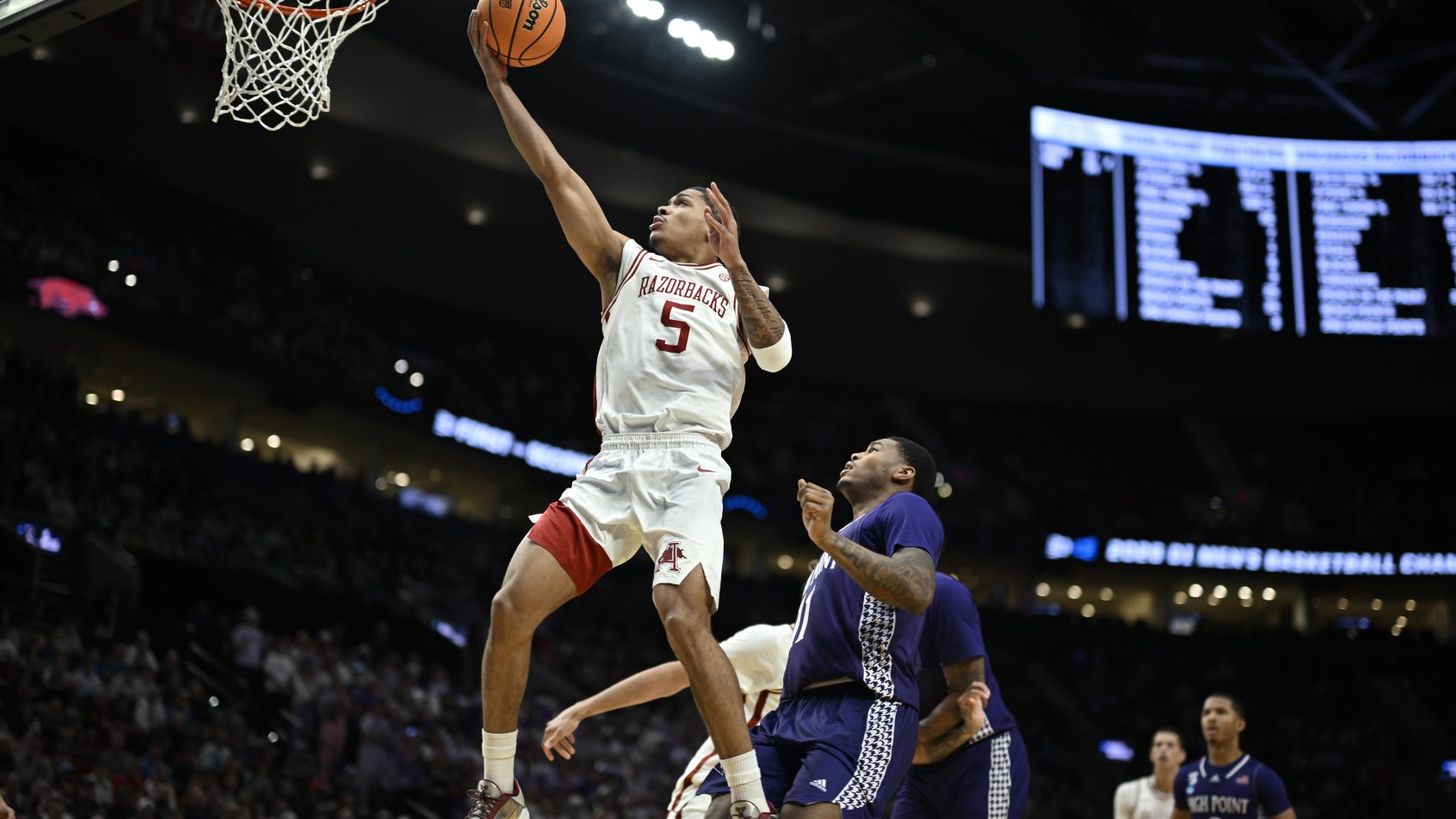 Arkansas Razorbacks guard Darius Acuff Jr rises for a layup