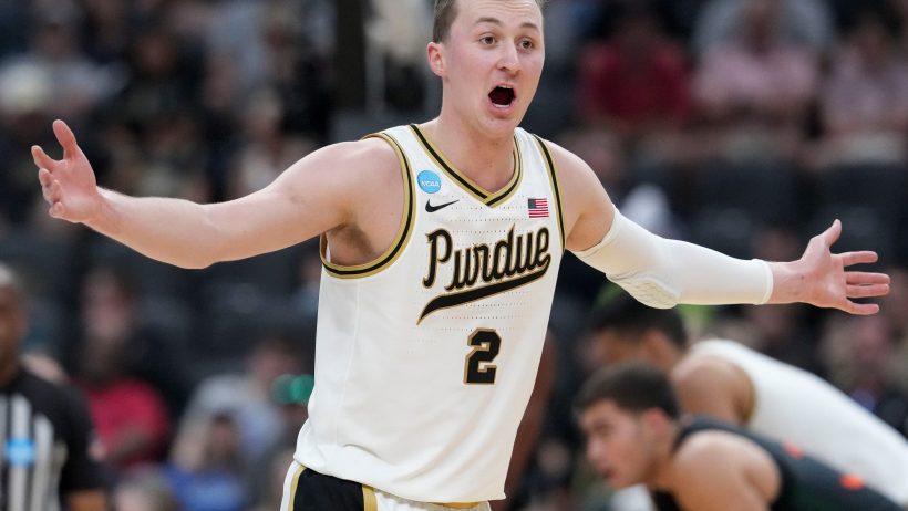 Purdue Boilermakers guard Fletcher Loyer looks to his bench