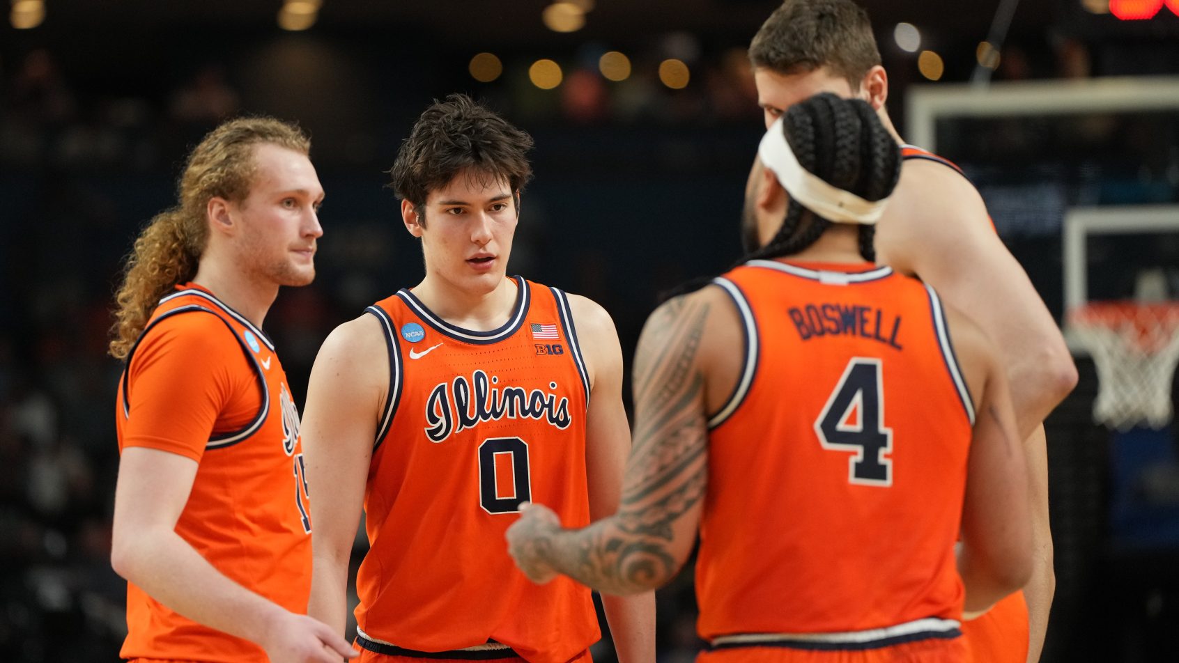 Illinois Fighting Illini players huddle