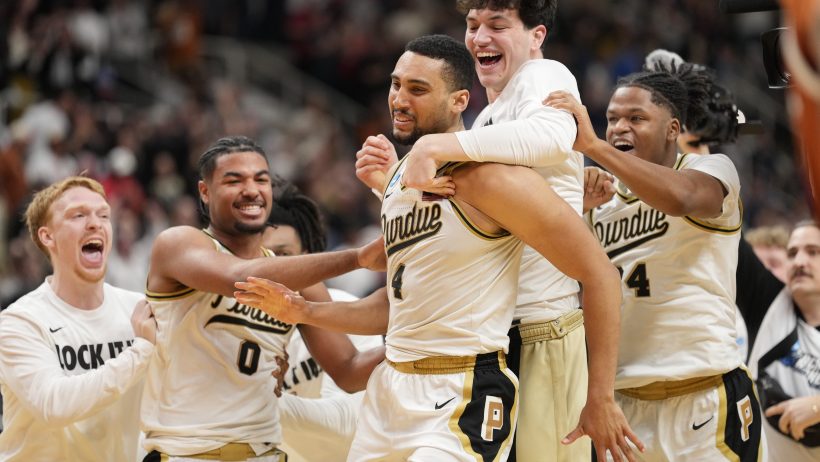 Purdue Boilermakers players celebrate a win over Texas