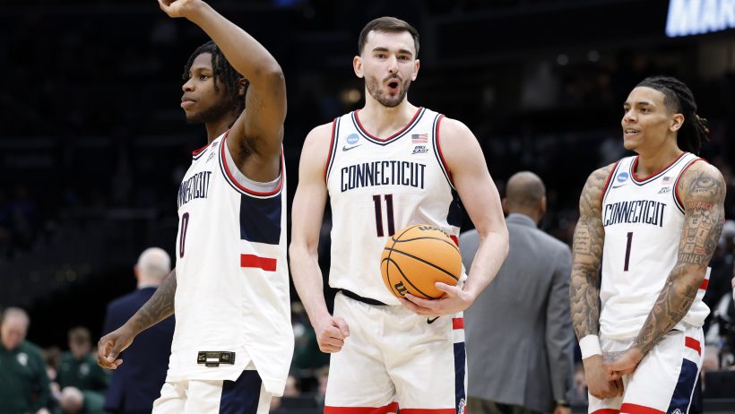 UConn Huskies players celebrate a win