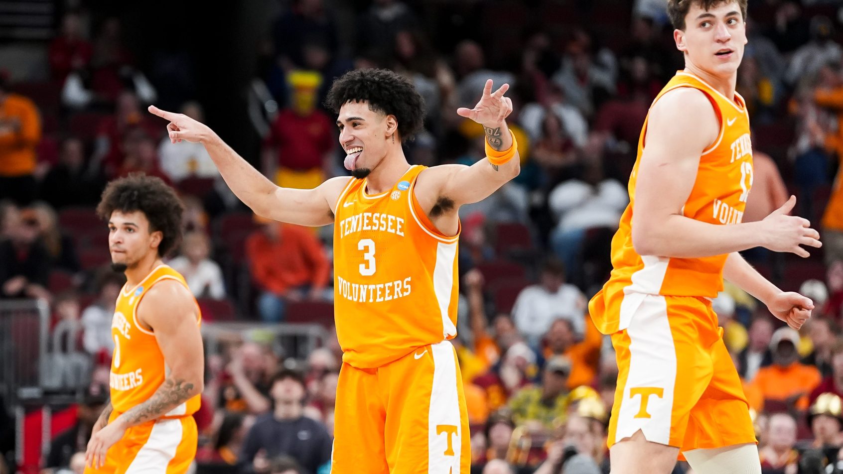 Tennessee guard Bishop Boswell gestures toward his own bench