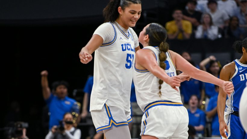 UCLA Bruins center Lauren Betts chest bumping guard Charlisse Leger-Walker