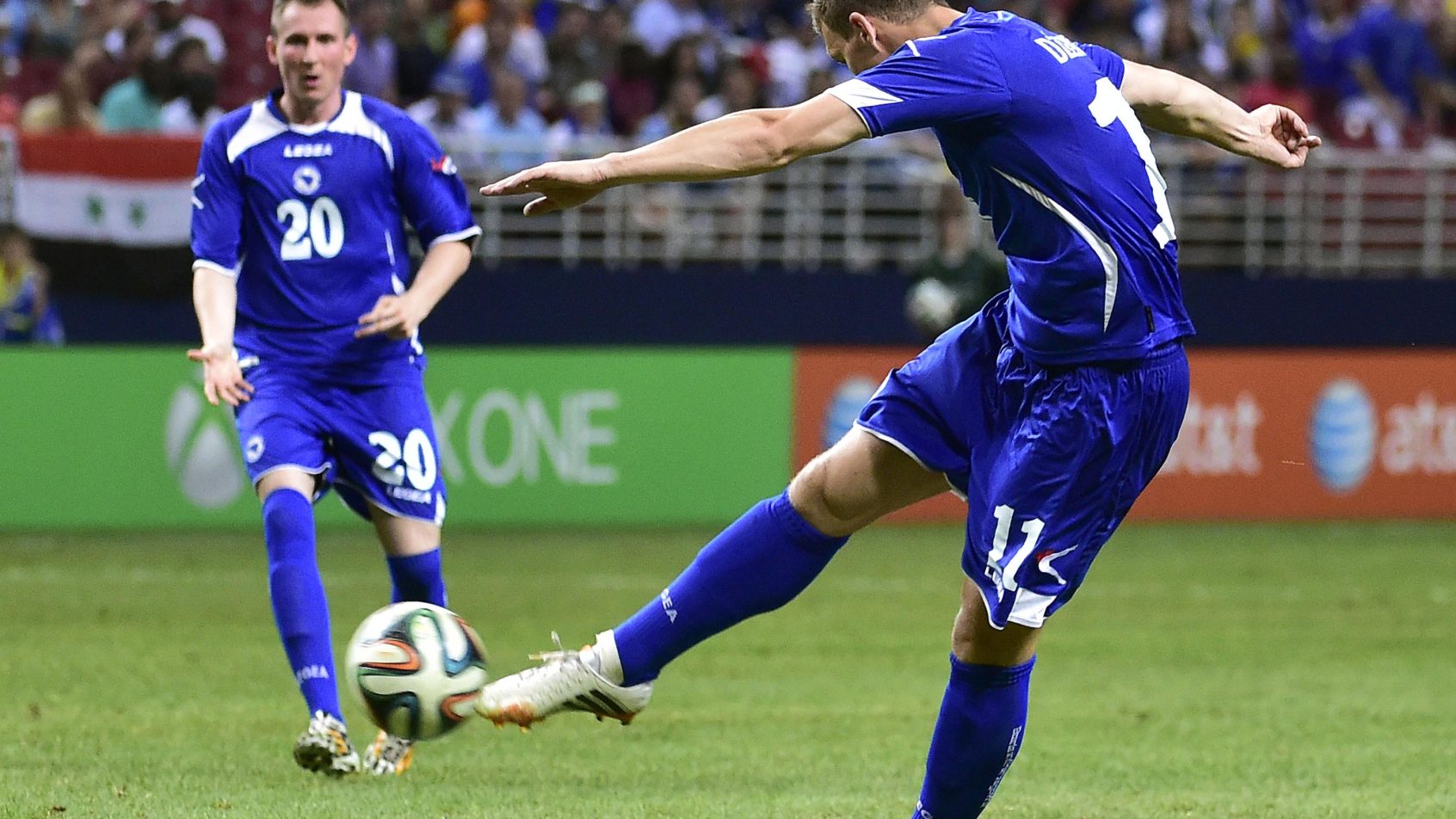 Bosnia player Edin Dzeko taking a penalty