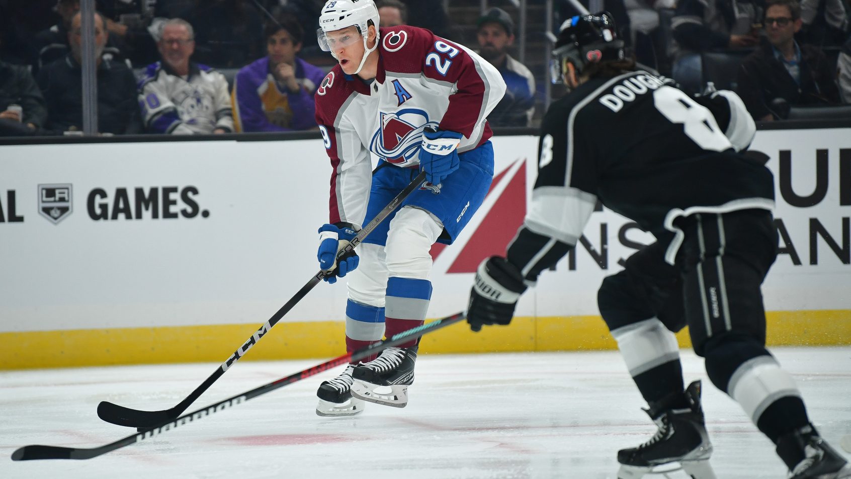 Nathan MacKinnon goes against the Kings