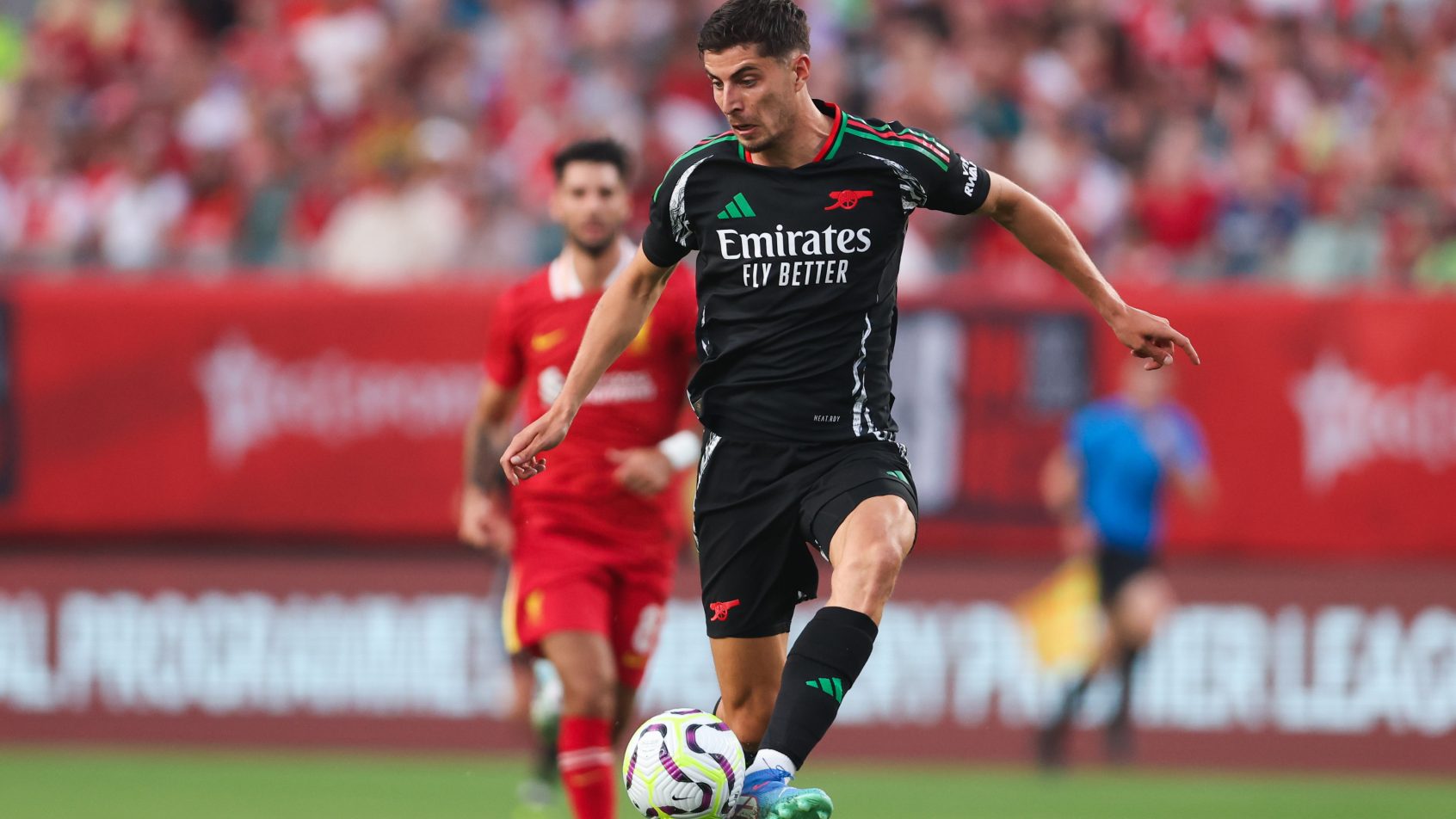 Arsenal midfielder Kai Havertz controlling the ball
