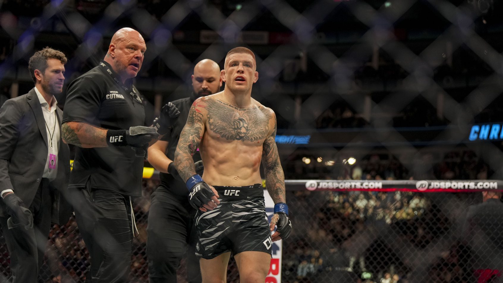 Jordan Vucenic (red gloves) fights against Chris Duncan (blue gloves) during UFC Fight Night at O2 Arena.