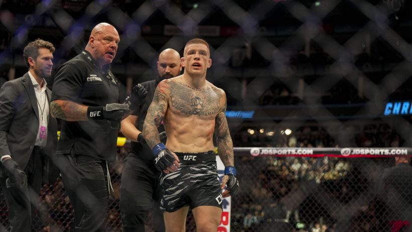 Jordan Vucenic (red gloves) fights against Chris Duncan (blue gloves) during UFC Fight Night at O2 Arena.