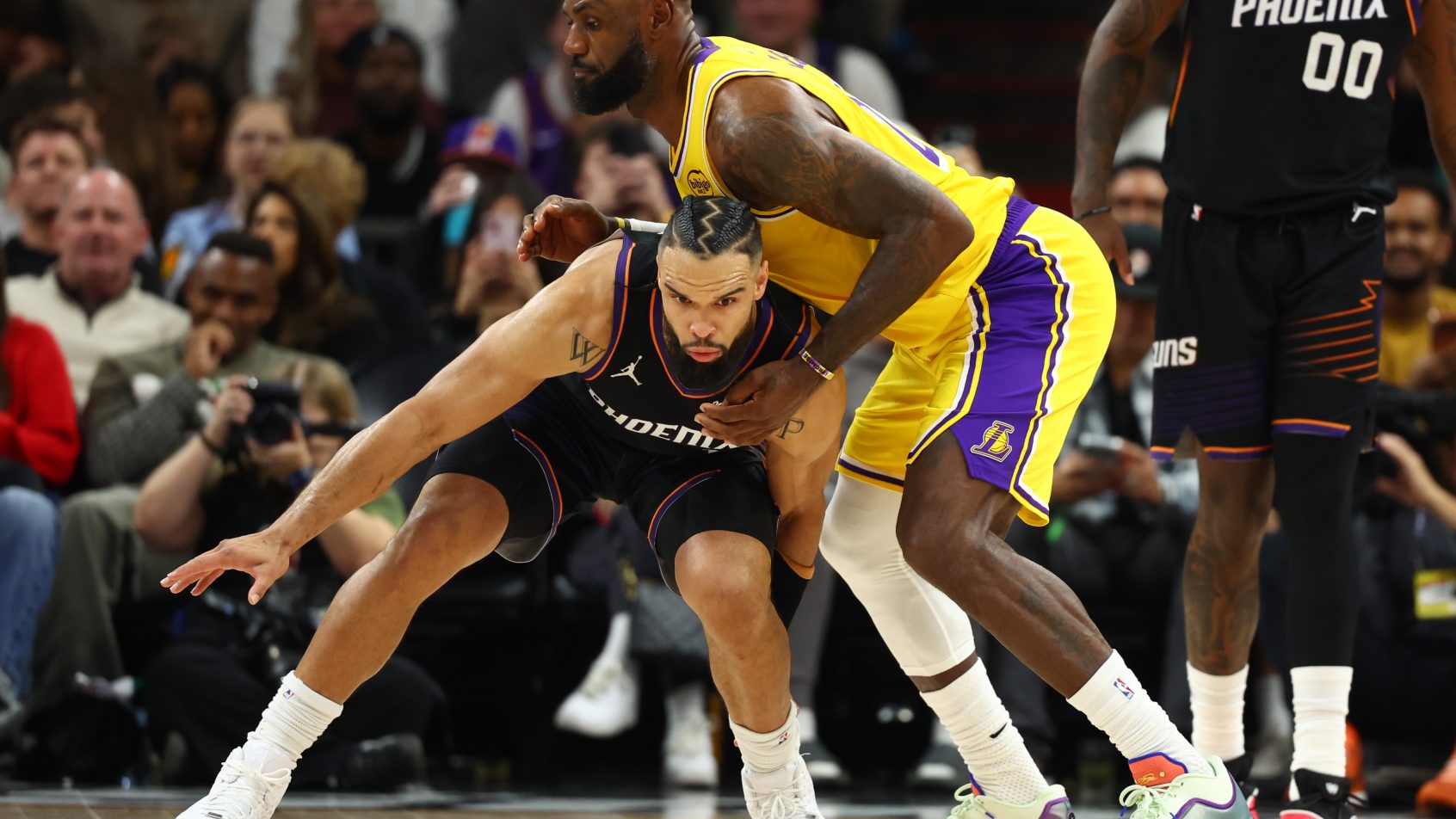 LeBron James battles against Dillon Brooks