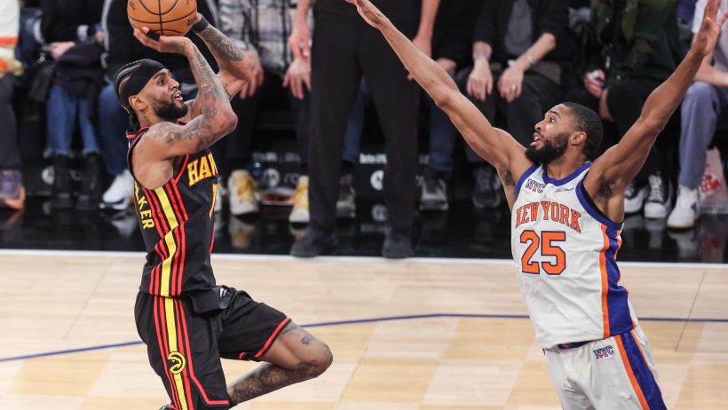 Nickeil Alexander-Walker shoots the basketball