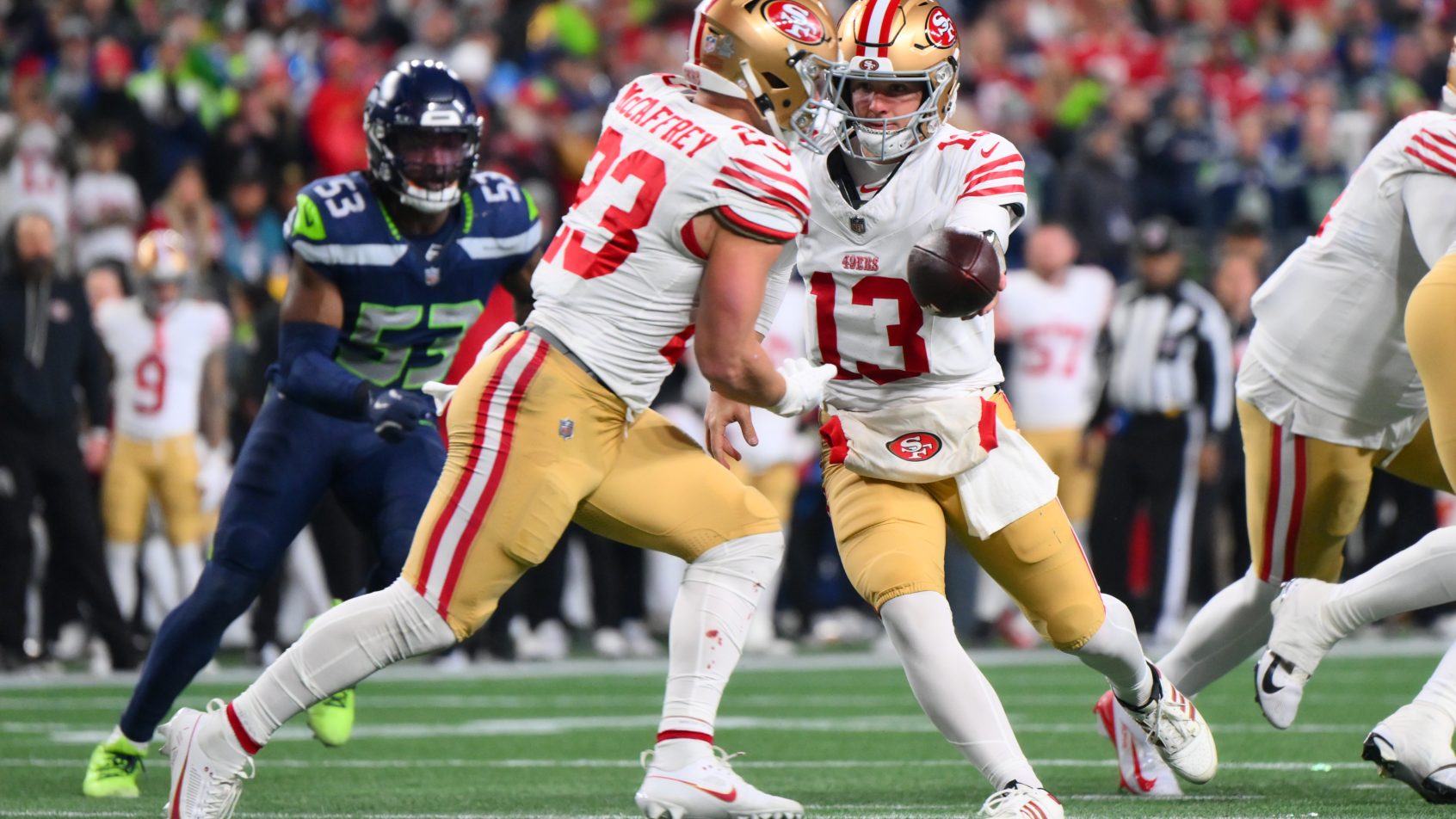 Christian McCaffrey taking a handoff