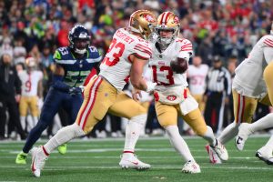 Christian McCaffrey taking a handoff