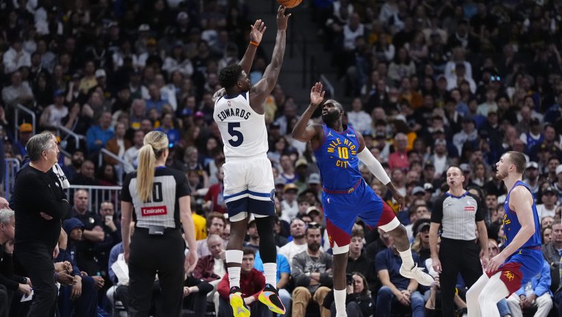 Anthony Edwards shoots over Denver Nuggets guard Tim Hardaway Jr