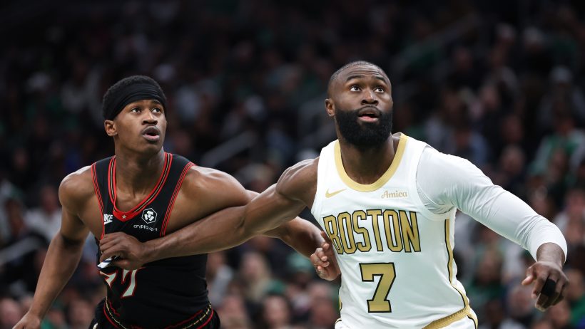 Jaylen Brown boxes out VJ Edgecombe