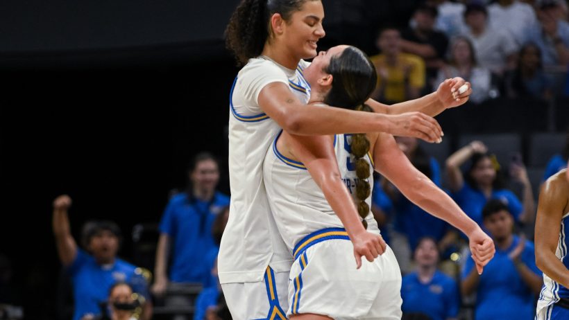 Lauren Betts celebrates with Charlisse Leger-Walker