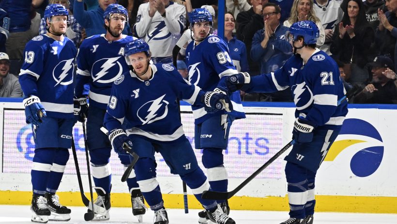 Jake Guentzel celebrates a goal with his Lightning teammates.