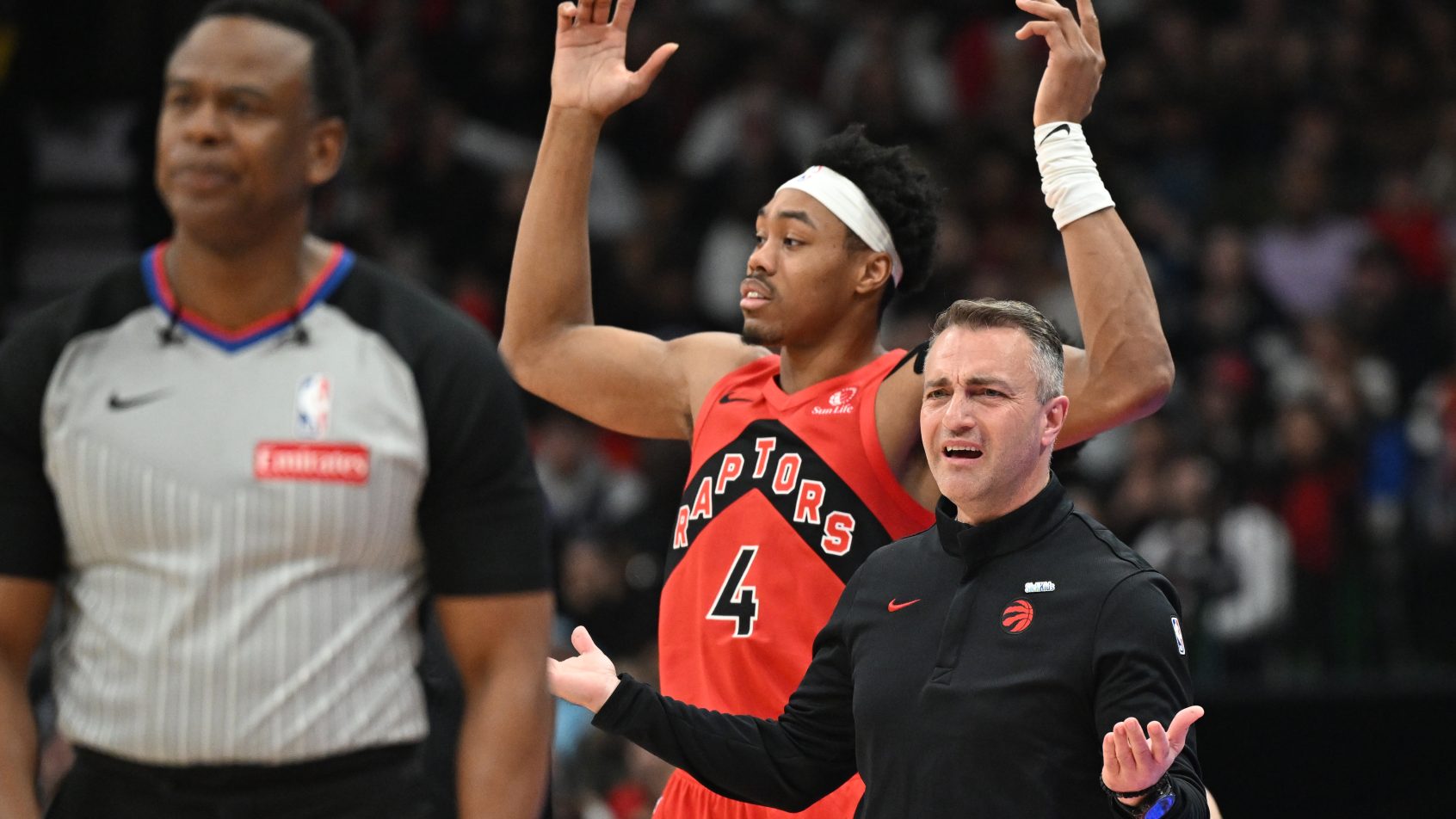 Scottie Barnes and Darko Rajakovic react to call against the Kings.