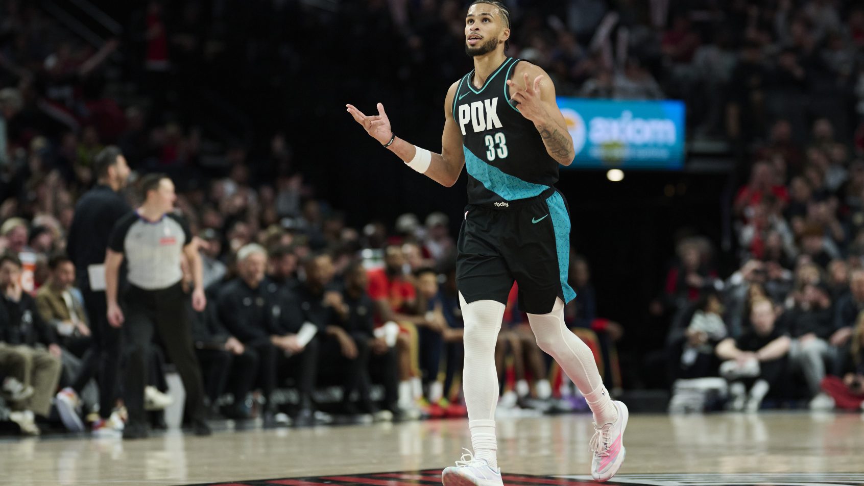 Toumani Camara reacts after splashing a triple versus the Pelicans.