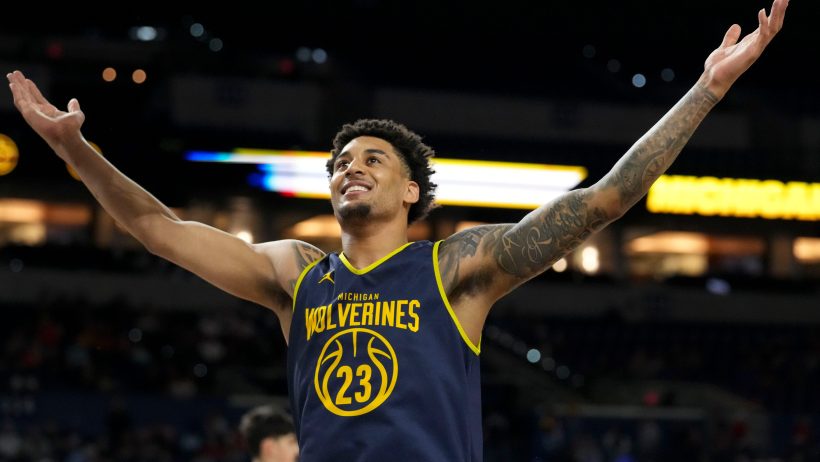 Michigan Wolverines forward Yaxel Lendeborg gestures to the stands during practice
