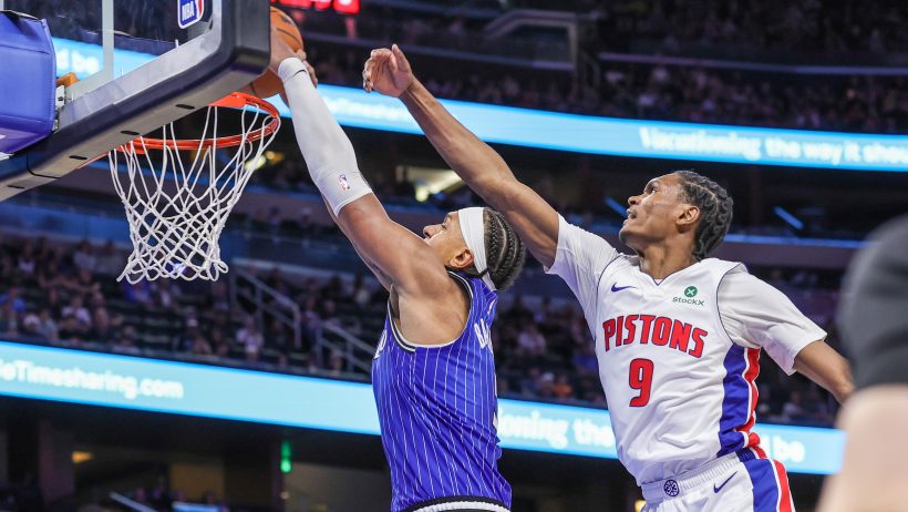 Ausar Thompson tries to block a Paolo Banchero dunk attempt.
