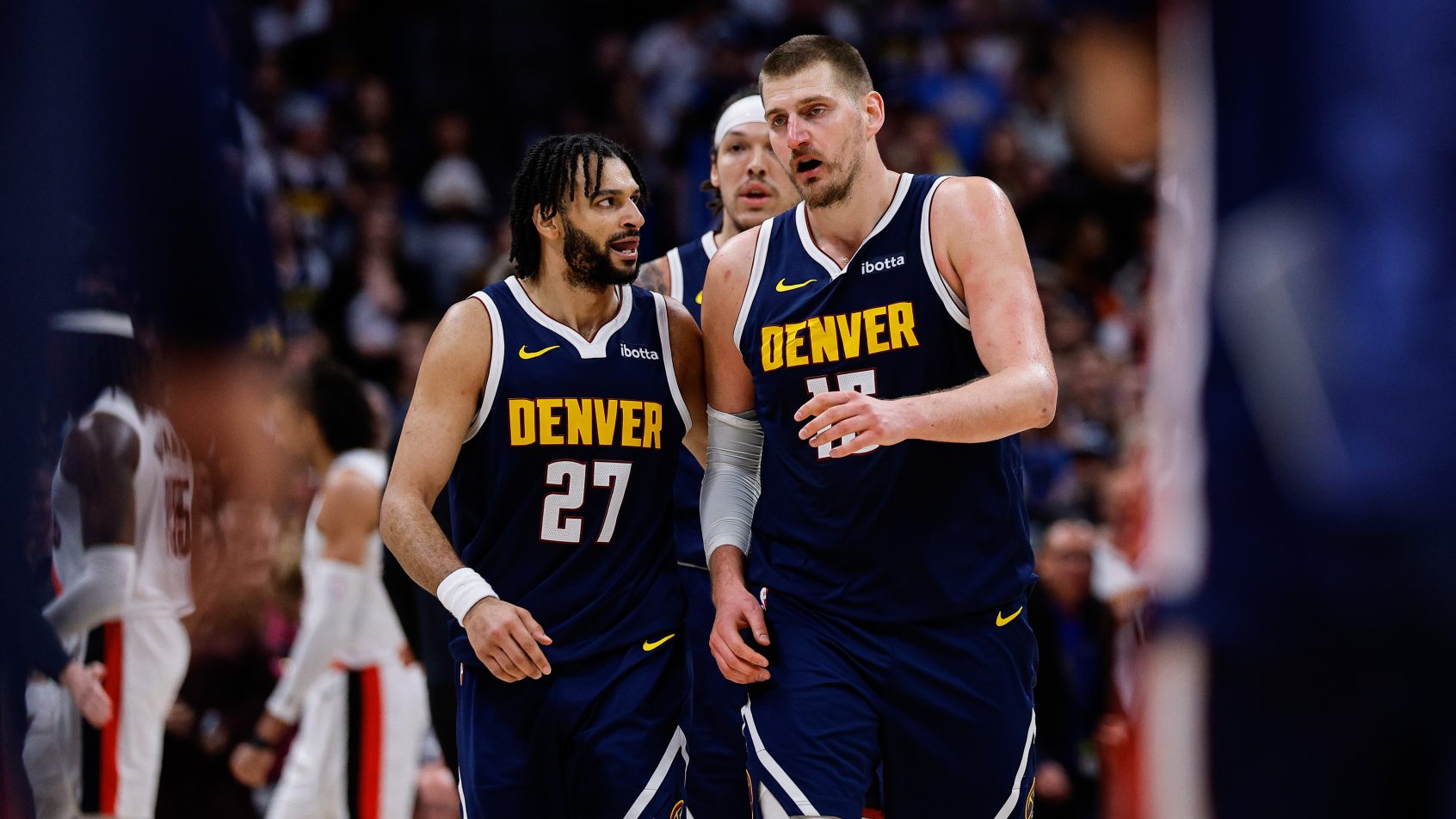 Nikola Jokic and Jamal Muray during a stoppage in play versus the Trail Blazers.
