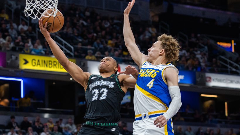 Minnesota Timberwolves guard Jaylen Clark shoots the ball while Indiana Pacers guard Taelon Peter defends.