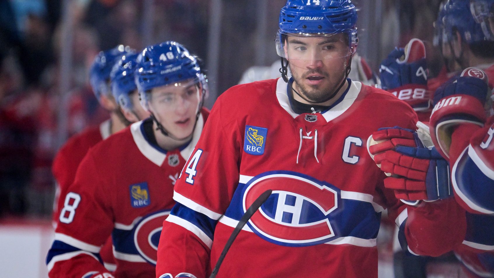 Nick Suzuki celebrates a Canadiens goal versus the Panthers.