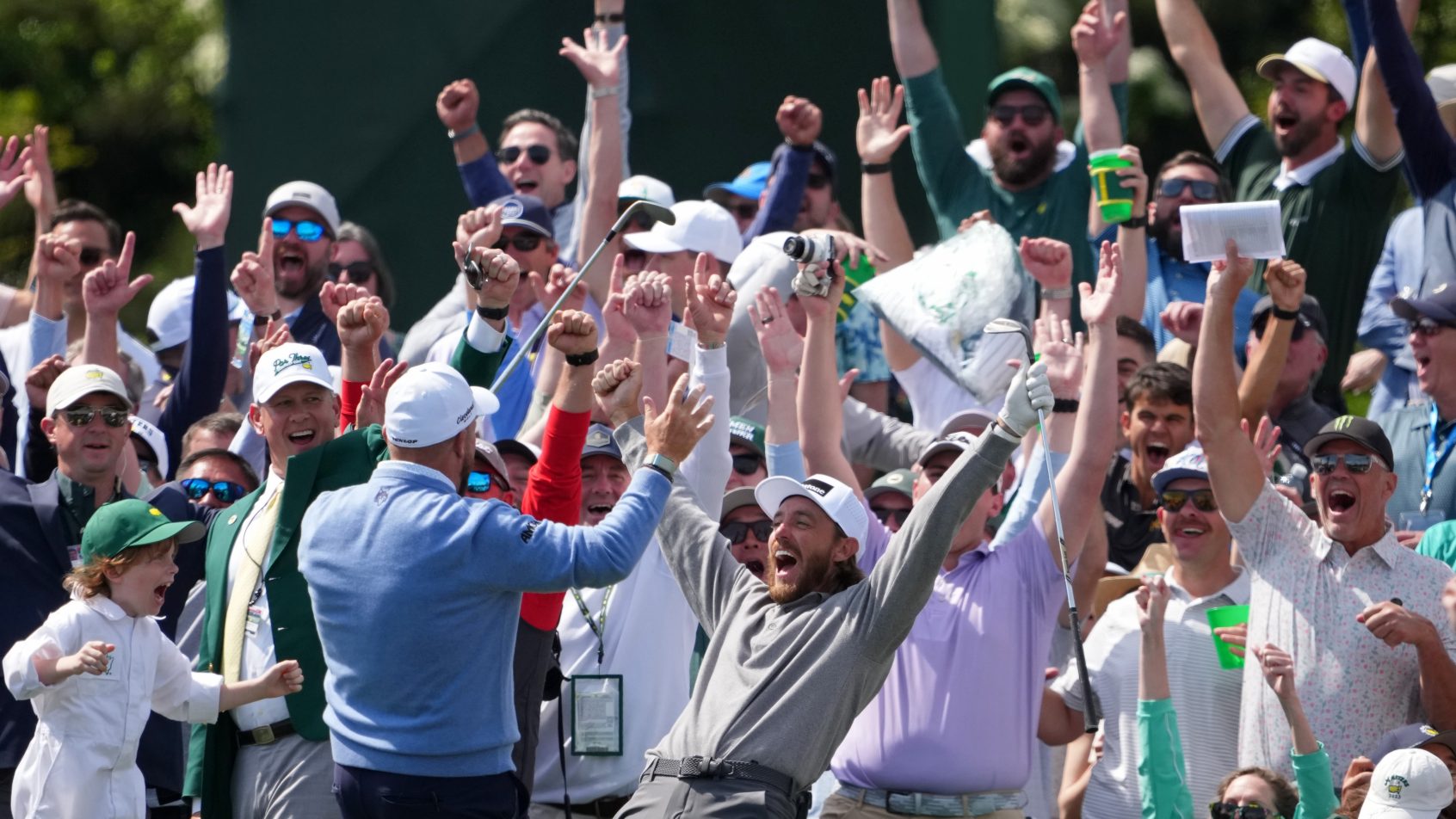 Tommy Fleetwood celebrates a hole-in-one at the Masters Par 3 contest