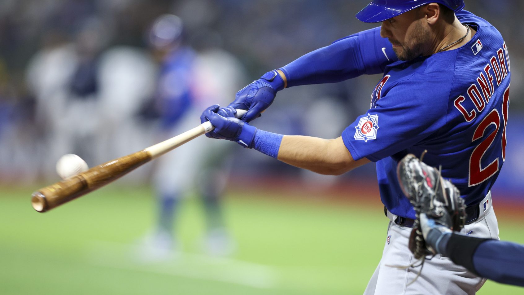 Chicago Cubs left fielder Michael Conforto hits a two-rbi double against the Tampa Bay Rays.