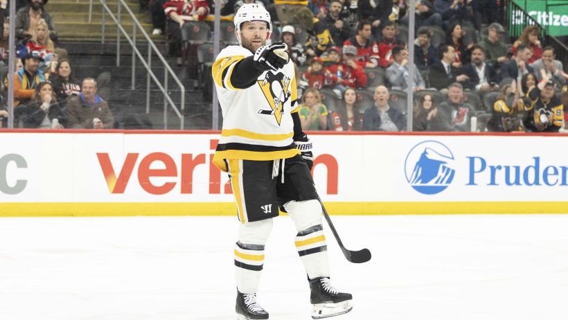 Bryan Rust celebrates a goal versus the Devils.