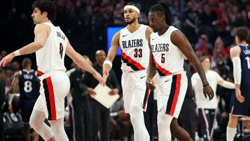 Blazers high-fives as they head back to the bench during a timeout in a game versus the Clippers.