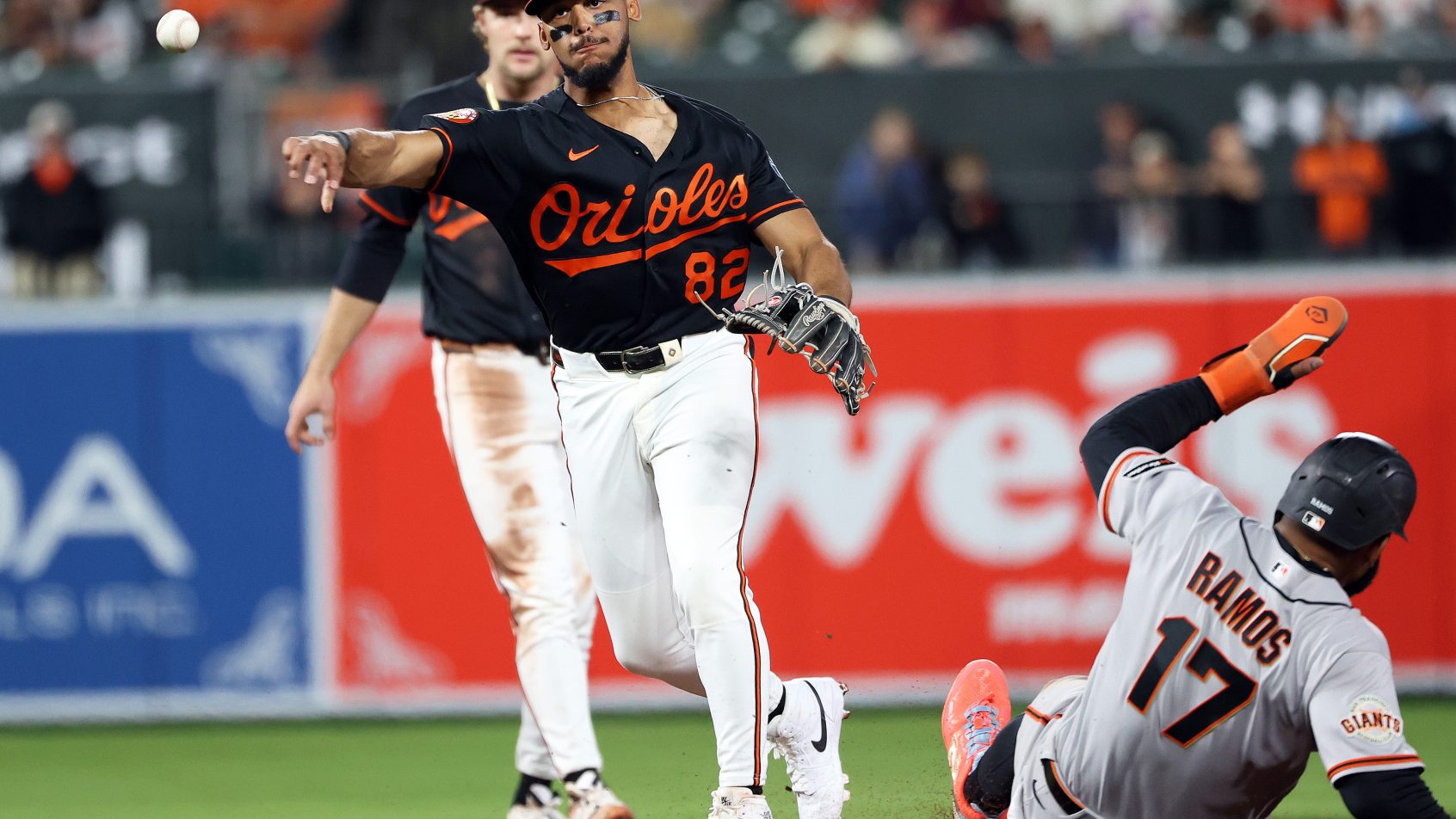 Baltimore Orioles second baseman Jeremiah Jackson turning a double-play