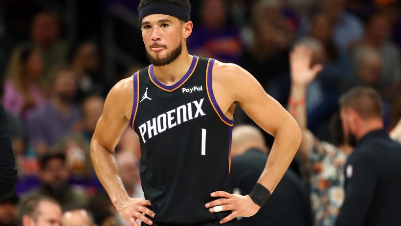 Devin Booker looks on during an NBA Play-In Tournament game versus the Blazers.
