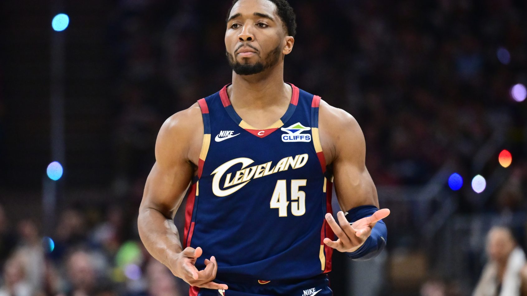 Donovan Mitchell celebrates after splashing a three.