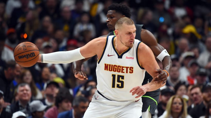 Nikola Jokic backs down Anthony Edwards in Game 1 of the T-wolves vs Nuggets series