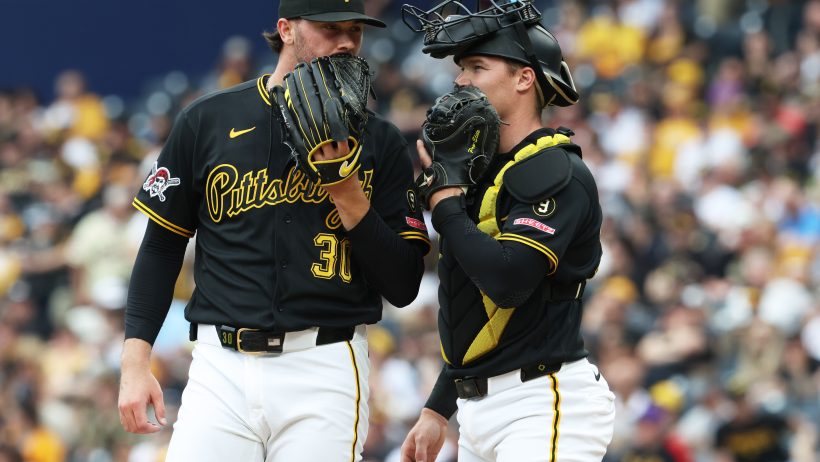 Paul Skenes talks to his catcher.